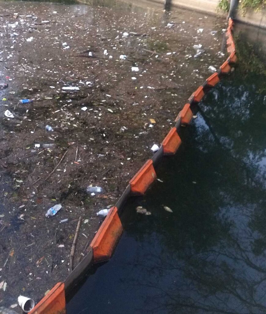 plastic litter along the water